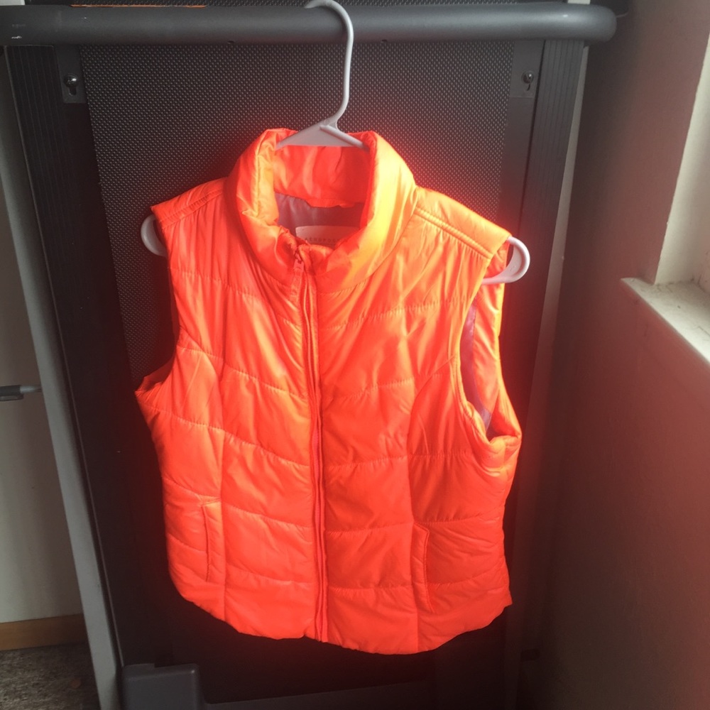 A neon pink vest